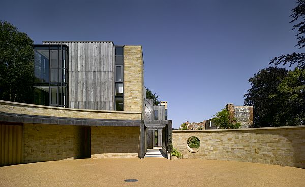 Circular courtyard with concave garage doors