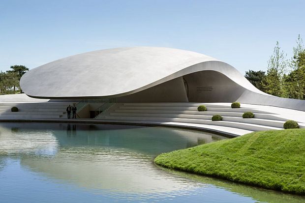 There are seats along the lagoon edge to contemplate the reflection of the Pavilion on the water 